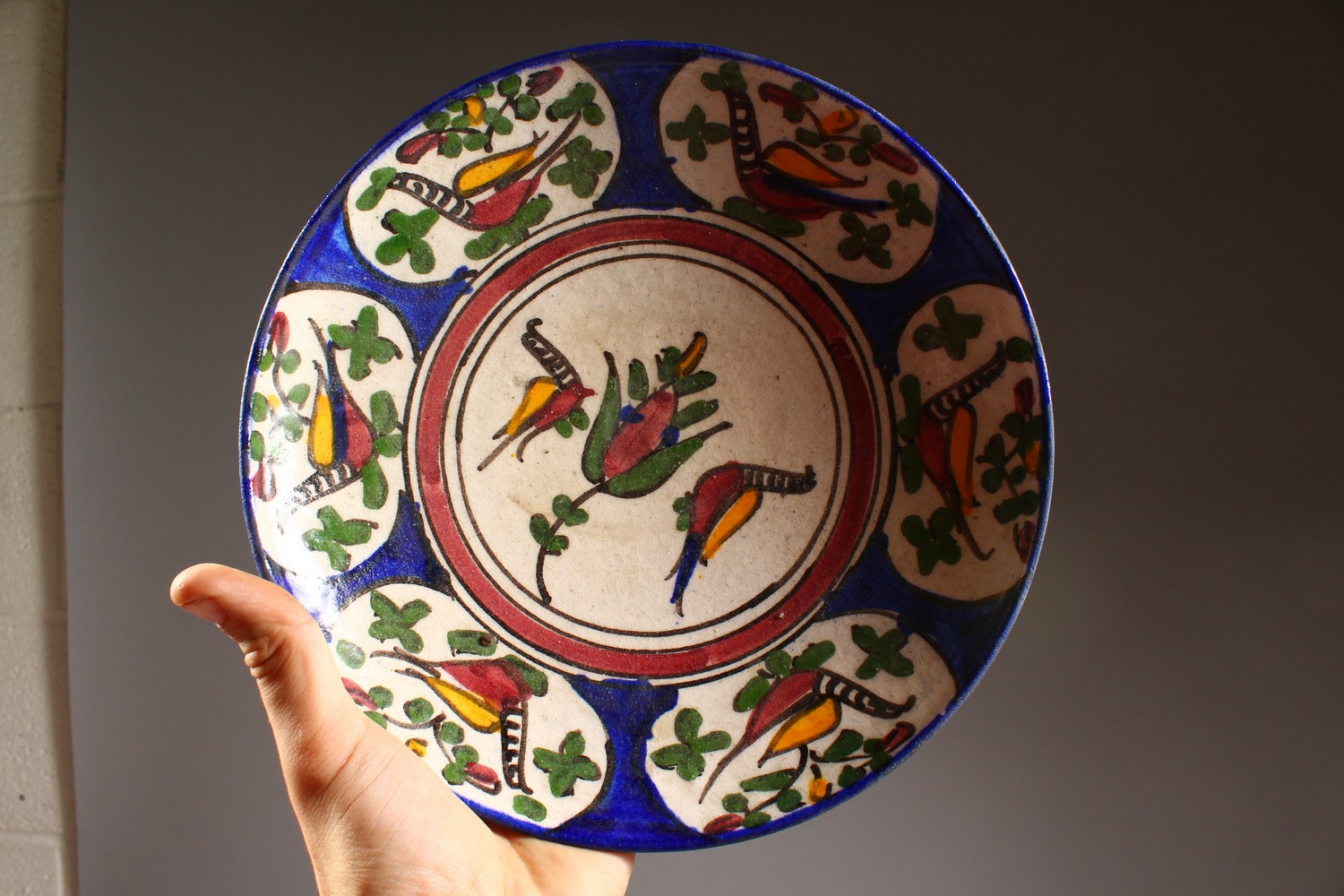 A SET OF FOUR ISLAMIC POTTERY BOWLS, each painted with stylised birds. 9.5ins diameter. - Image 6 of 9