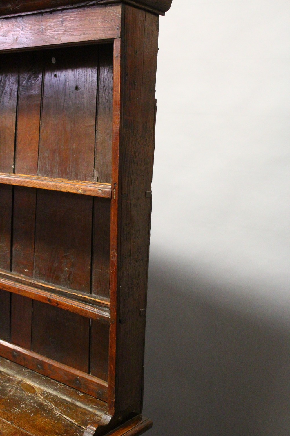 AN 18TH CENTURY OAK DRESSER, with a double Delft rack, the base with three cupboard doors, each part - Image 4 of 6