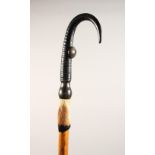 AN ALPINE WALKING STICK, with hoof handle. 39ins long.