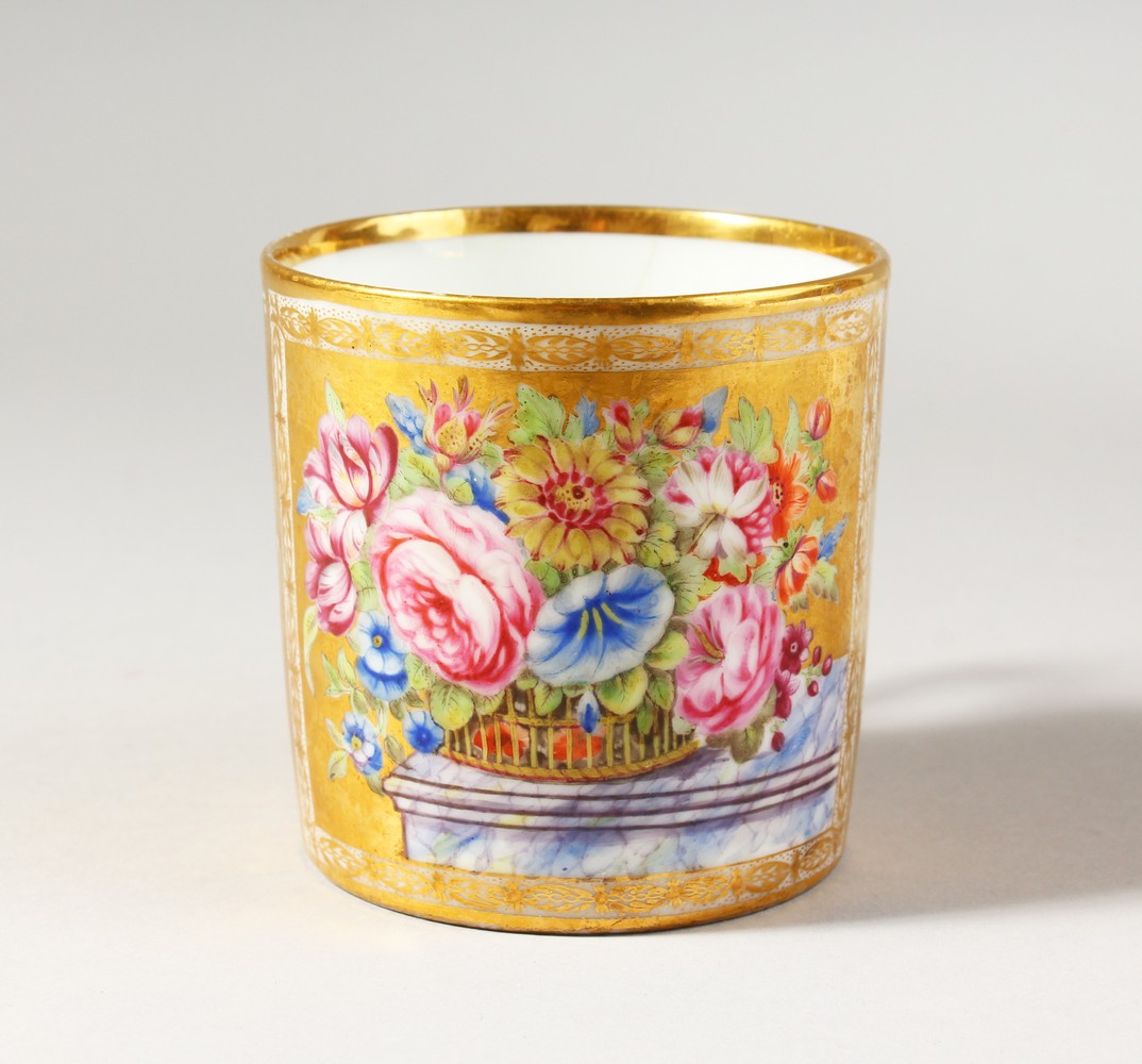 A BEAUTIFULLY PAINTED AND GILDED PARIS PORCELAIN MUG, having flowers in a basket on a solid gilt