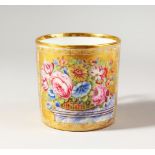 A BEAUTIFULLY PAINTED AND GILDED PARIS PORCELAIN MUG, having flowers in a basket on a solid gilt