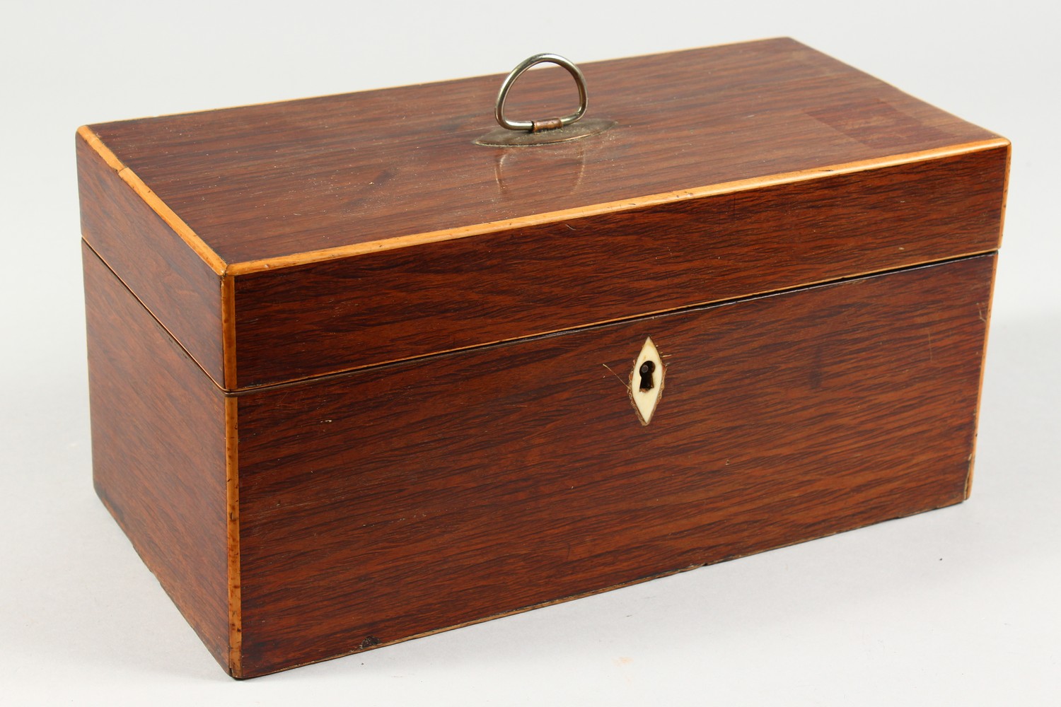 A 19TH CENTURY PARTRIDGE WOOD RECTANGULAR TEA CADDY. 12ins wide.