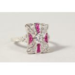 A SILVER ART DECO DESIGN FAUX RUBY AND CZ RING.