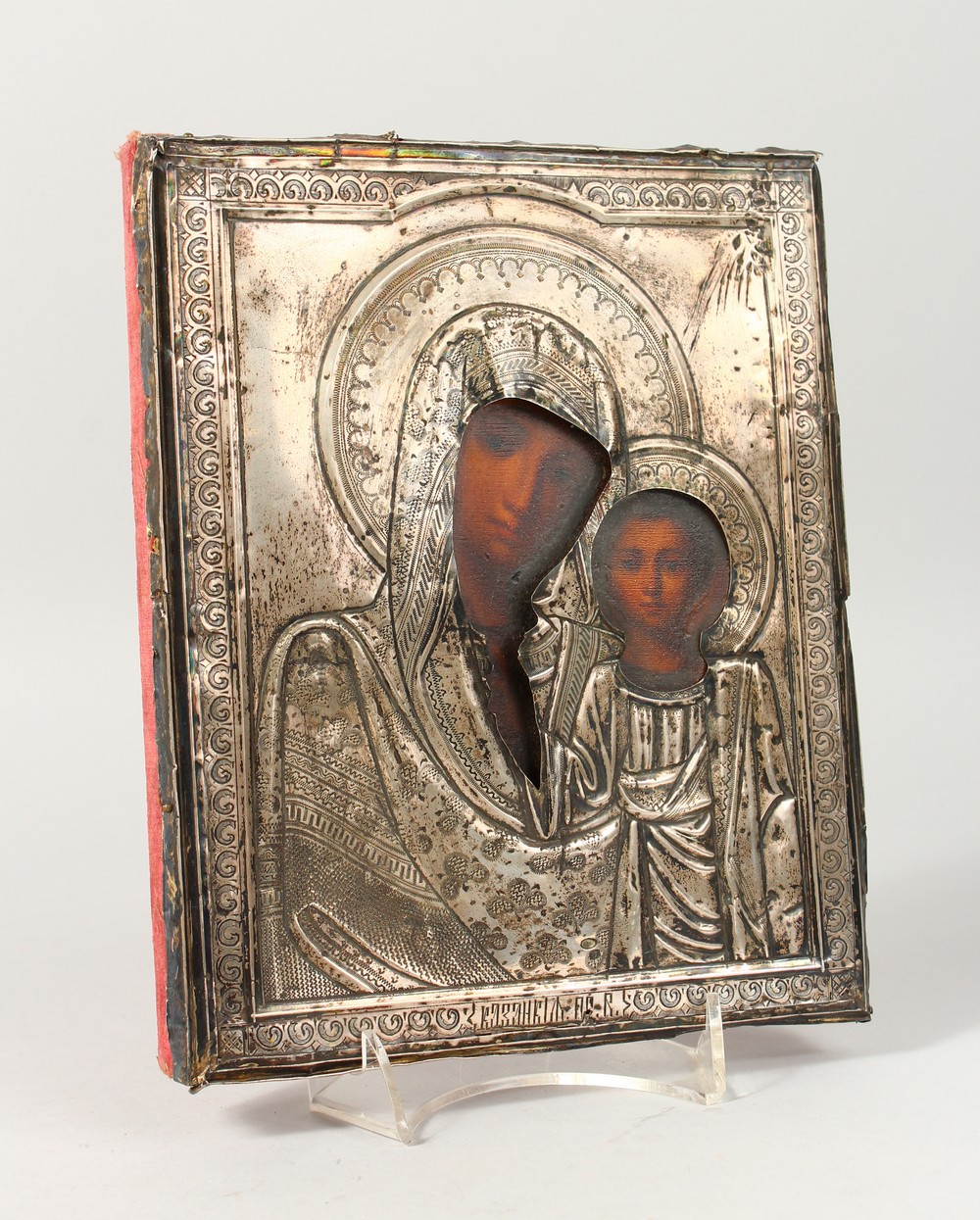 MADONNA AND CHILD, with silver overlay. Maker faint. 9ins x 7ins.