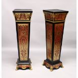 A PAIR OF BOULLE STYLE TAPERING SQUARE COLUMNS, with ormolu mounts. 4ft 0ins high.