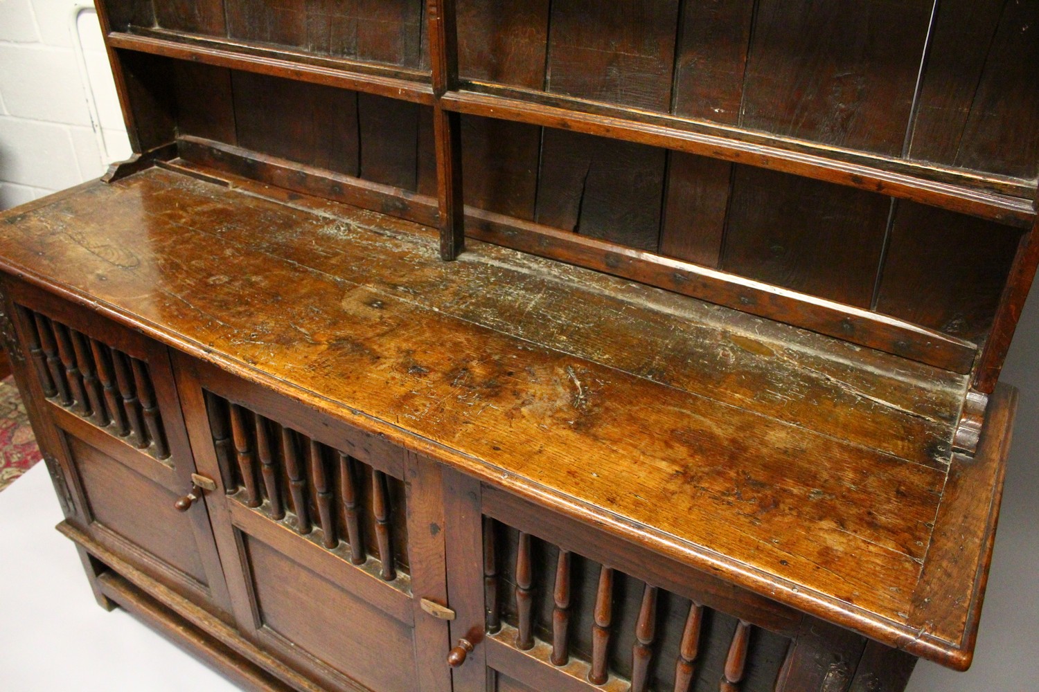 AN 18TH CENTURY OAK DRESSER, with a double Delft rack, the base with three cupboard doors, each part - Image 3 of 6