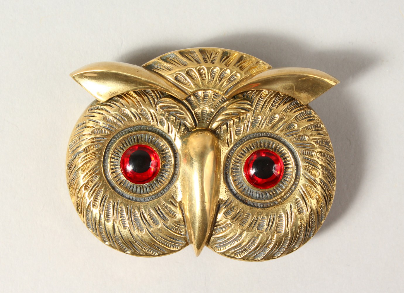 A BRASS OWL VESTA.