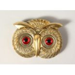 A BRASS OWL VESTA.