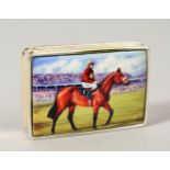 A SILVER PILL BOX, the lid with an enamel of a horse and jockey.