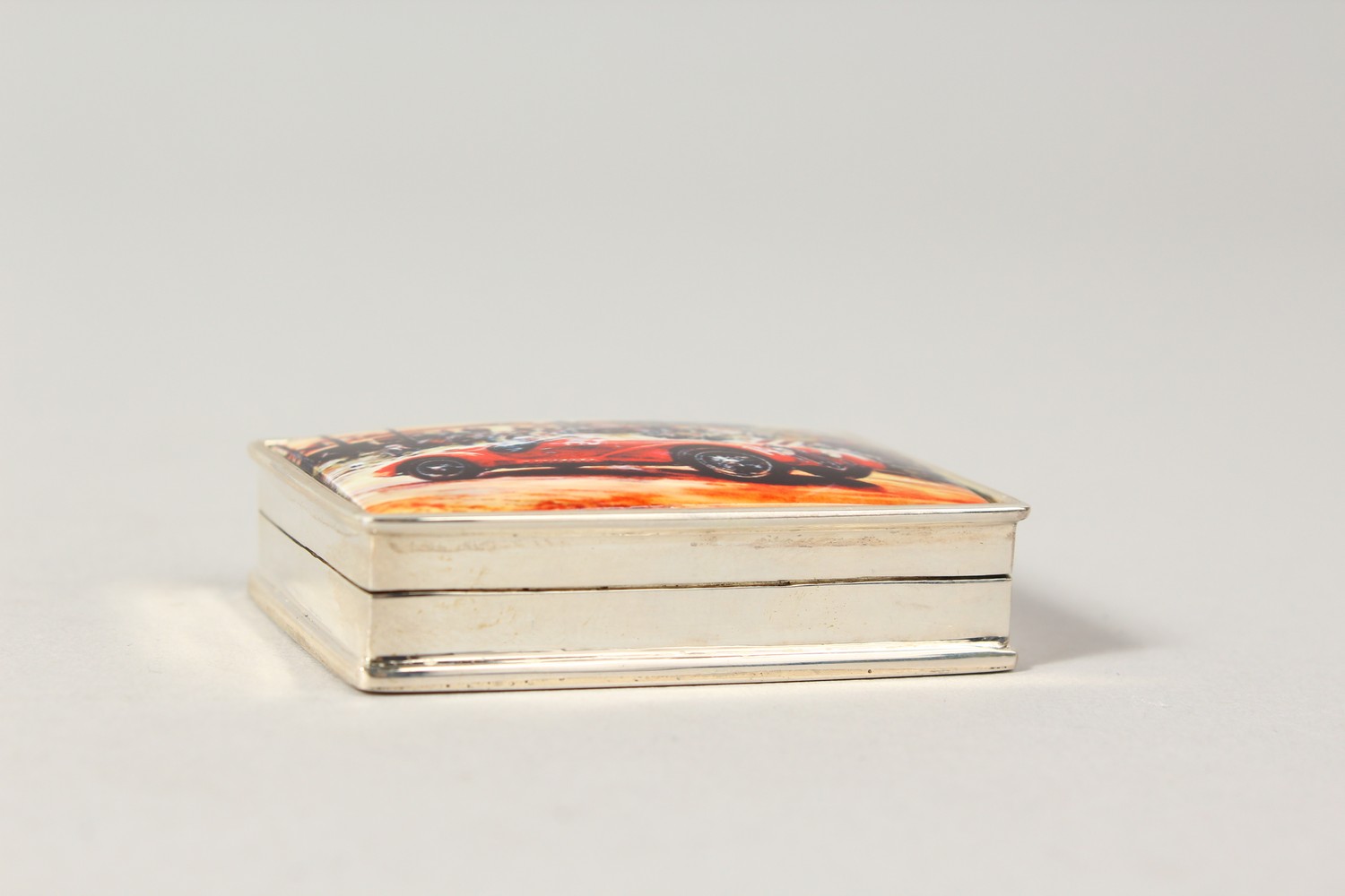 A SILVER PILL BOX, the lid with an enamel of a racing car. - Image 2 of 4