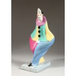 A DAX COLOURFUL POTTERY FIGURE OF A CLOWN (AF). 13.5ins high.