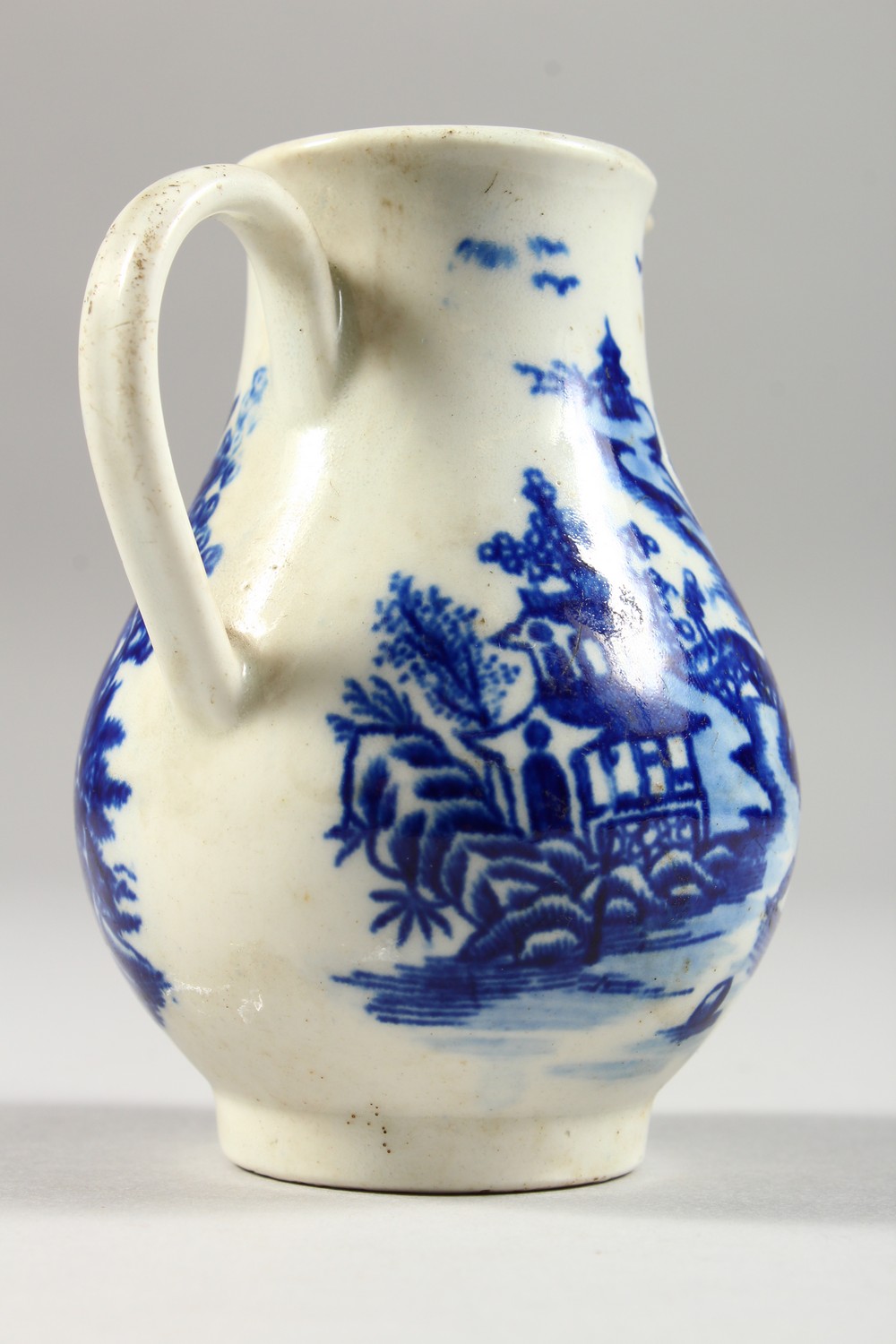 A WILLOW PATTERN DESIGN SPARROW BEAK JUG. 3.5ins high. - Image 4 of 11