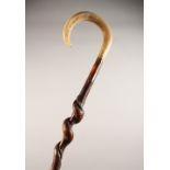 A HORN HANDLED SHEPHERD'S CROOK, with barley twist shaft. 48ins long.