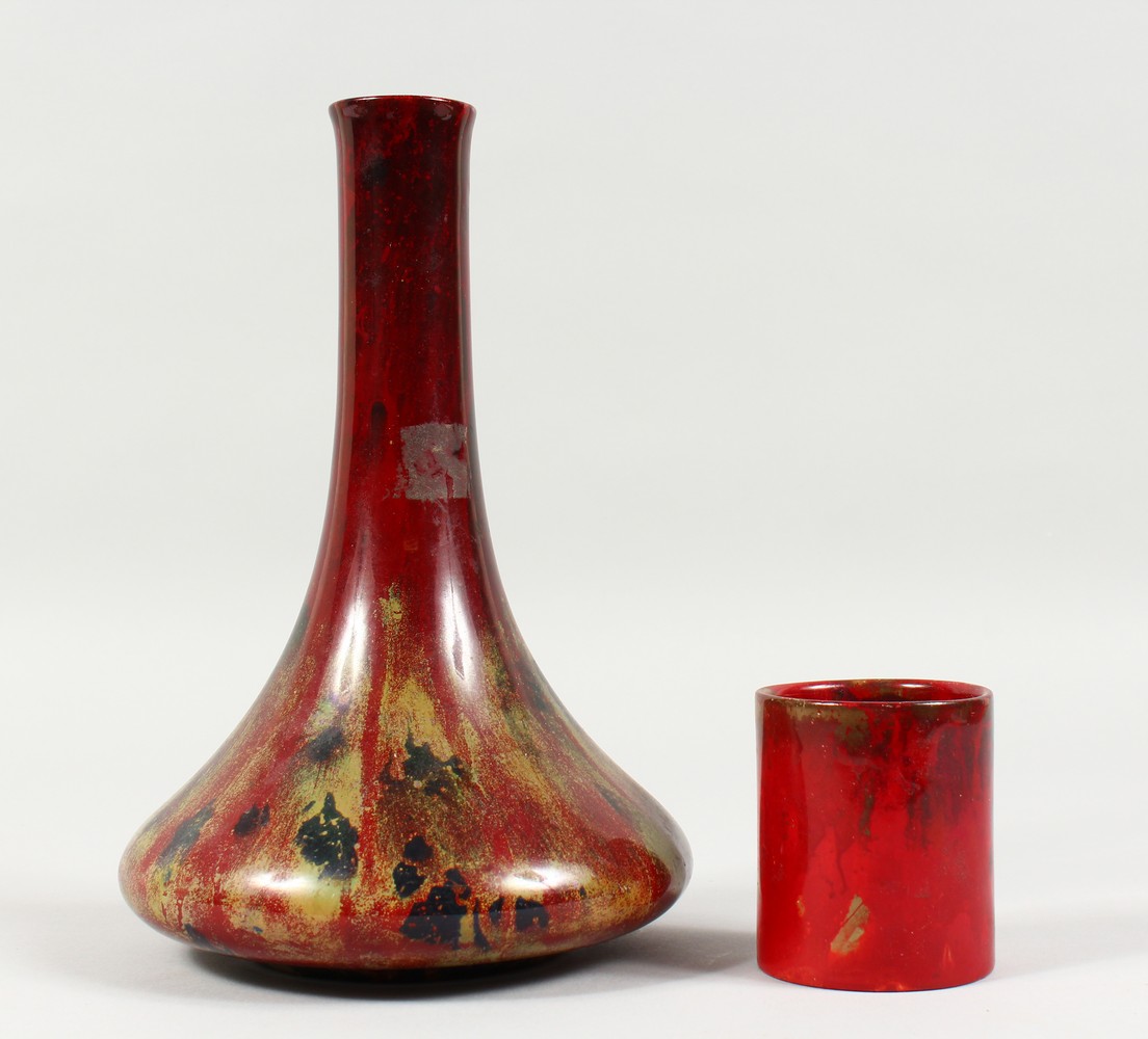 E. R. WILKES, A RED LUSTRE GLAZED VASE, with narrow neck and broad base, signed and dated 1923;