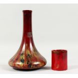 E. R. WILKES, A RED LUSTRE GLAZED VASE, with narrow neck and broad base, signed and dated 1923;