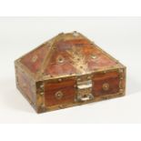 AN EASTERN BRASS BOUND WOODEN CASKET. 9ins wide.