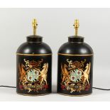 A PAIR OF TOLEWARE LAMPS, modelled as tea canisters. 18ins high.