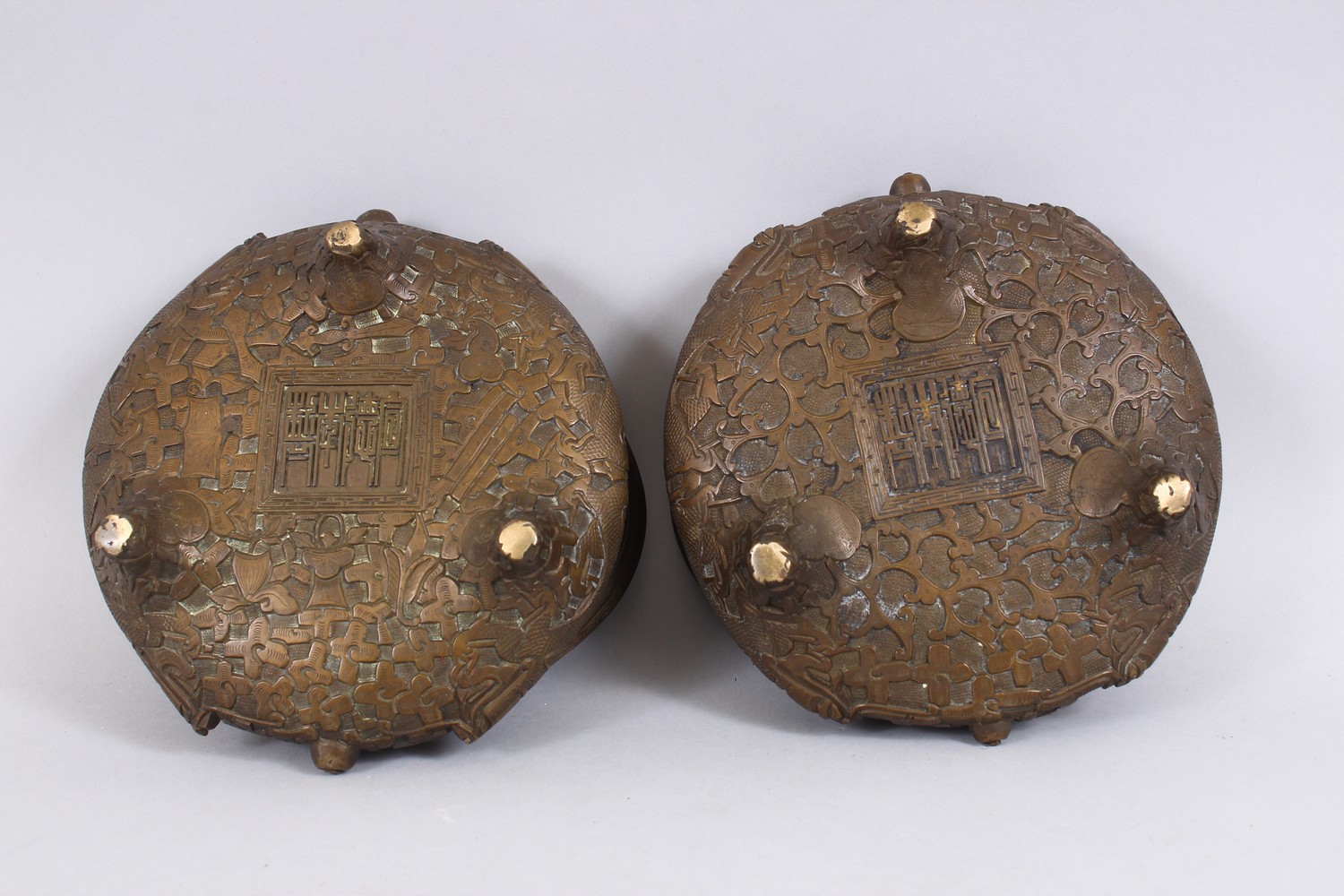 TWO GOOD CHINESE BRONZE TRIPOD CENSERS, Both with deep carved scenes of chilongs and archaic design, - Image 7 of 9