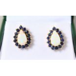 A PAIR OF 9CT GOLD, PEAR SHAPED OPAL AND SAPPHIRE EARRINGS.