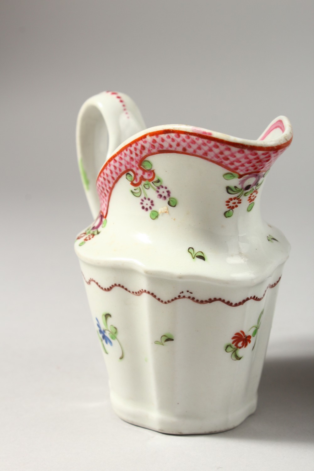 TWO NEW HALL CREAM JUGS, painted in Oriental export style. - Image 3 of 10