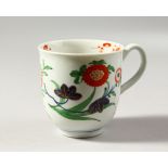 A LARGE WORCESTER COLOURED COFFEE CUP, perhaps for chocolate, painted with large Oriental flowers,