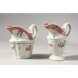 TWO NEW HALL CREAM JUGS, painted in Oriental export style.