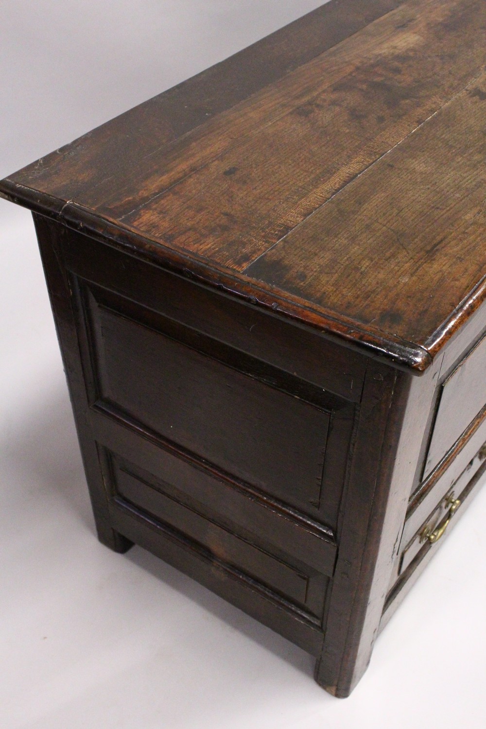 AN 18TH CENTURY OAK COFFER BACH, with rising top, panelled front and two drawers, on stile feet. 4ft - Image 9 of 10