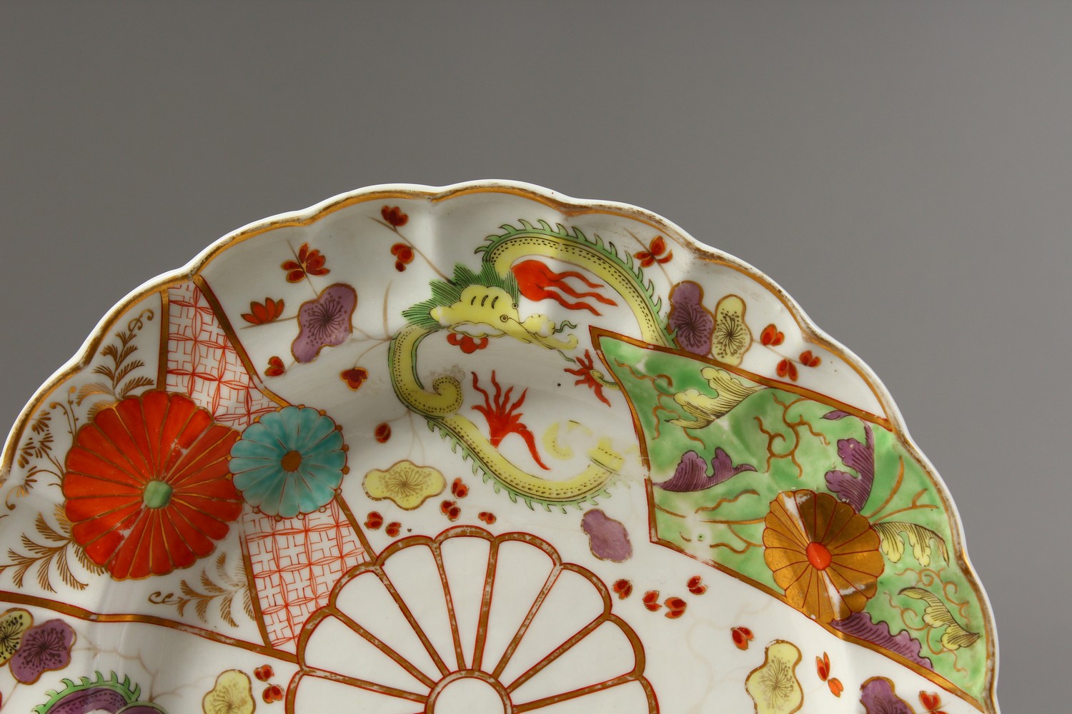 A WORCESTER COLOURED PLATE, painted with dragons, flowering prunus and chrysanthemums, rare gold - Image 2 of 9