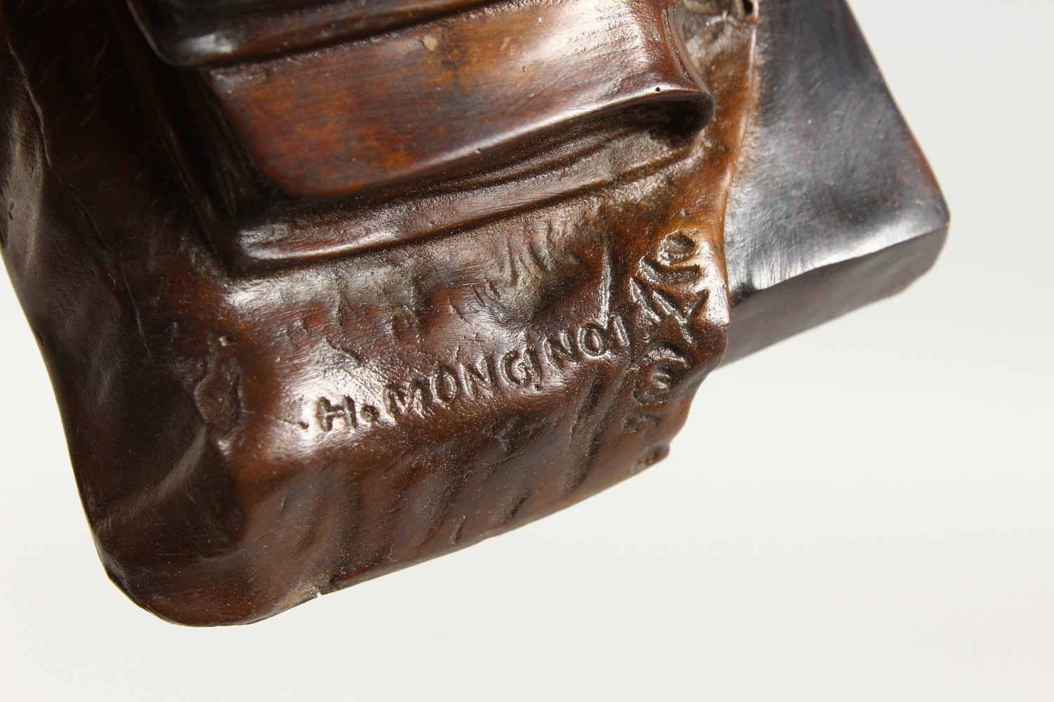 A SMALL CAST BRONZE MODEL OF A YOUNG GIRL ASLEEP AGAINST A PILE OF BOOKS. 5ins wide. - Image 5 of 6