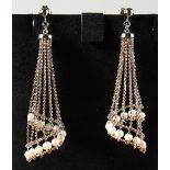 A PAIR OF SILVER AND PEARL CHANDELIER EARRINGS.
