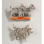 TWO NOVELTY SILVER SCOTTIE DOG BROOCHES.