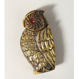 A BRASS OWL VESTA.