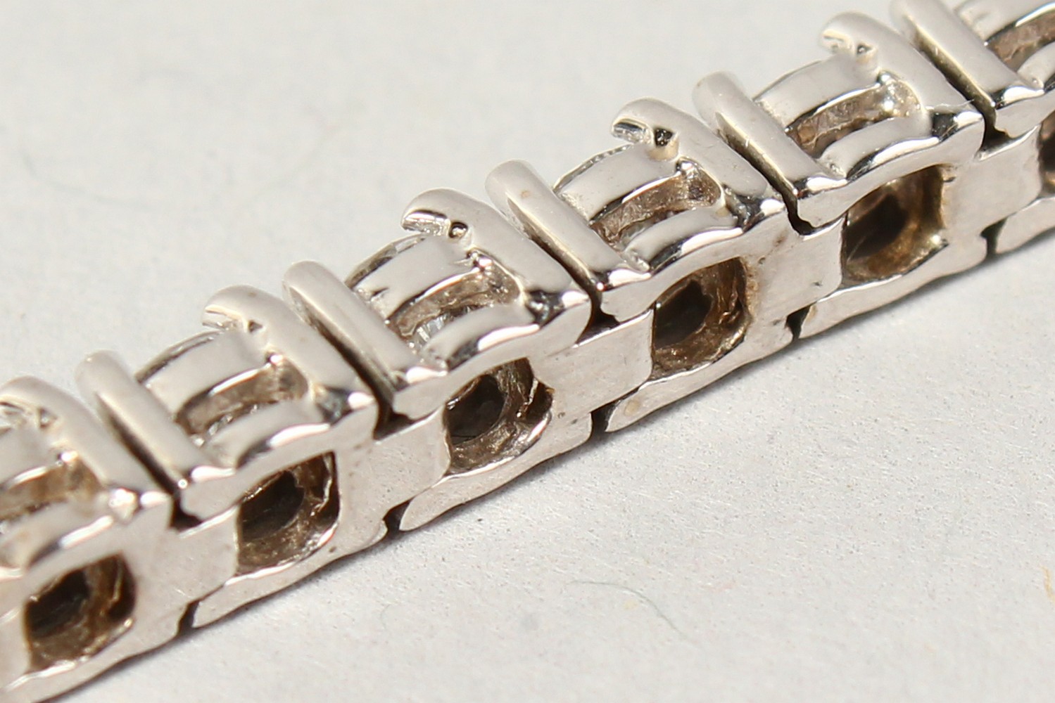 AN 18CT WHITE GOLD DIAMOND LINE BRACELET, with forty-nine diamonds, approx. 6CTS, G/H Colour, V1- - Image 4 of 19