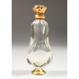 A GOLD TOP CUT GLASS SCENT BOTTLE. 4ins high.