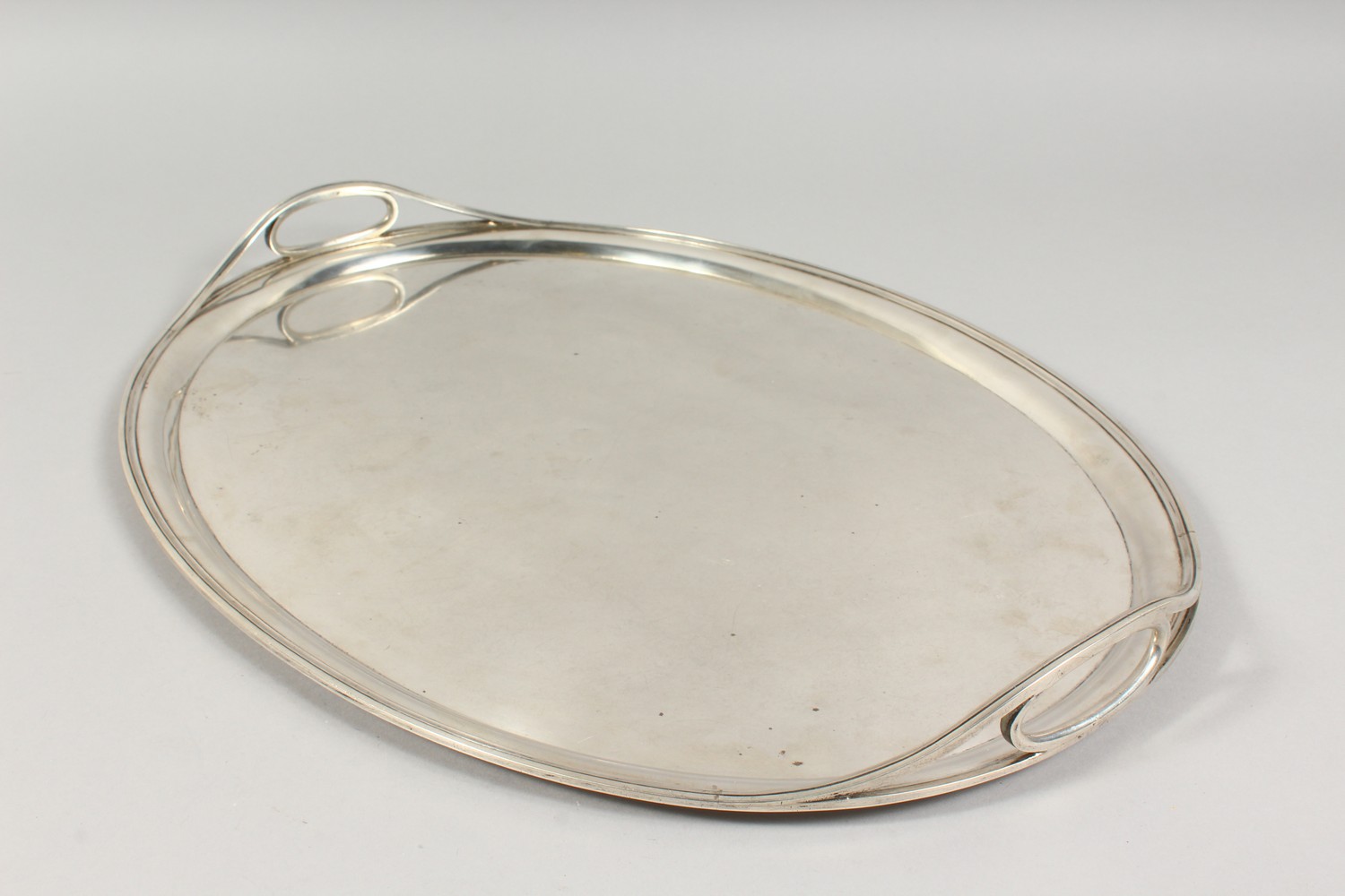 KHLEBNIKOV - A PLAIN SILVER RUSSIAN OVAL TWO-HANDLED TEA TRAY. Mark BC MOSCOW 1873. 20ins long. - Image 7 of 7