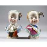 TWO MEISSEN BUSTS OF YOUNG GIRLS, one with a plume of feathers in her hair, the other with a posy of