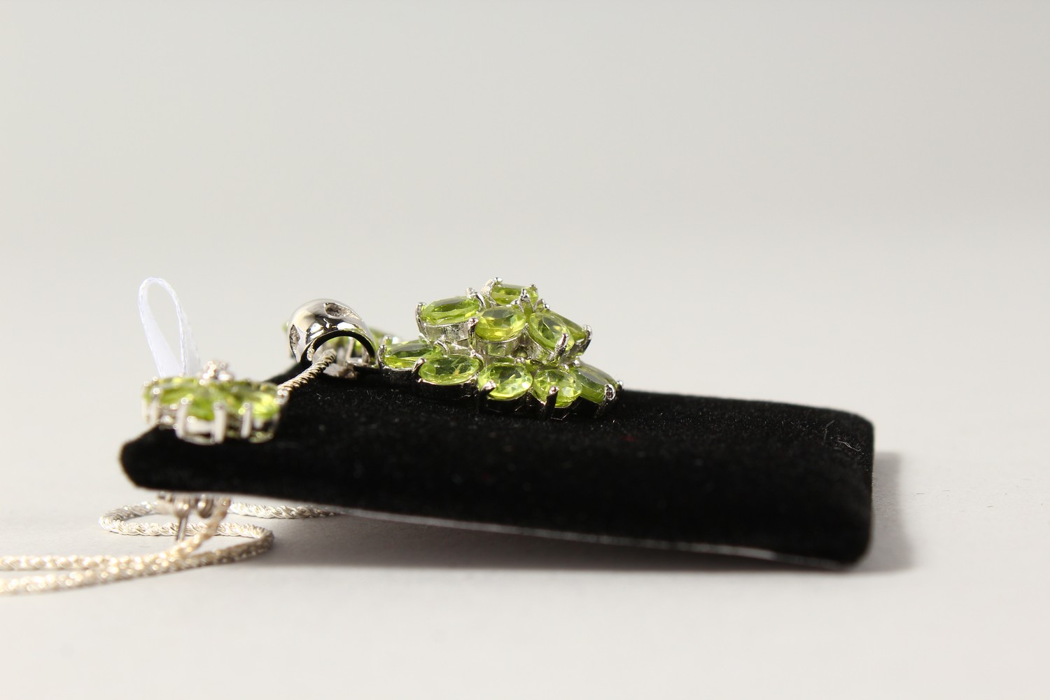 A SILVER PERIDOT SET PENDANT, on chain, and EAR STUDS. - Image 2 of 2
