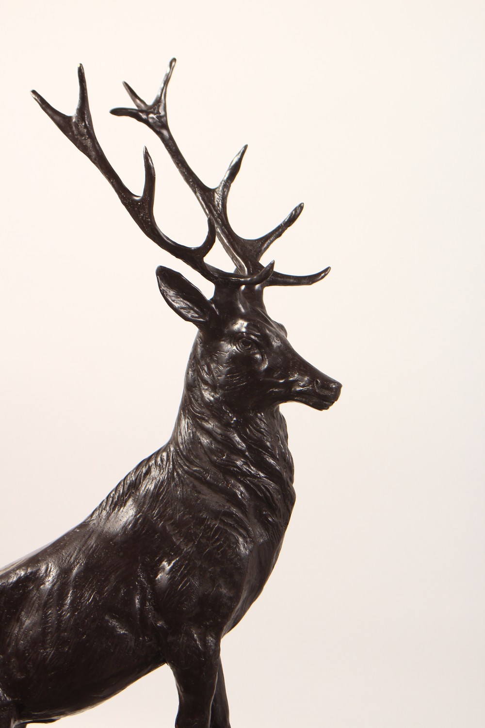 A PAIR OF LARGE BRONZE STAGS, standing on a rock, on marble bases. 29ins high. - Image 2 of 7