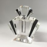 A LARGE CLEAR AND BLACK GLASS ART DECO STYLE SCENT BOTTLE. 9ins high.
