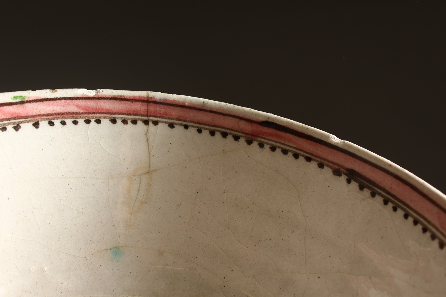 AN EARLY ISLAMIC POTTERY CIRCULAR BOWL, painted with birds. 7.5ins diameter. - Image 6 of 7