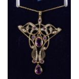 A 9CT GOLD, AMETHYST AND SEED PEARL ART NOUVEAU STYLE PENDANT AND CHAIN.