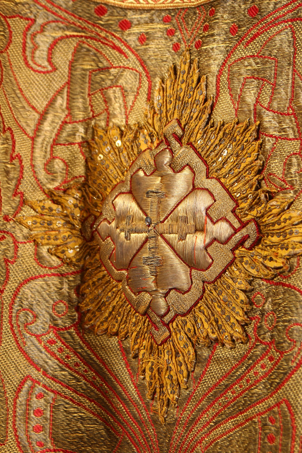 AN UNUSUAL EARLY 20TH CENTURY RUSSIAN COAT, with highly ornate gold thread embroidered decoration, - Image 16 of 22