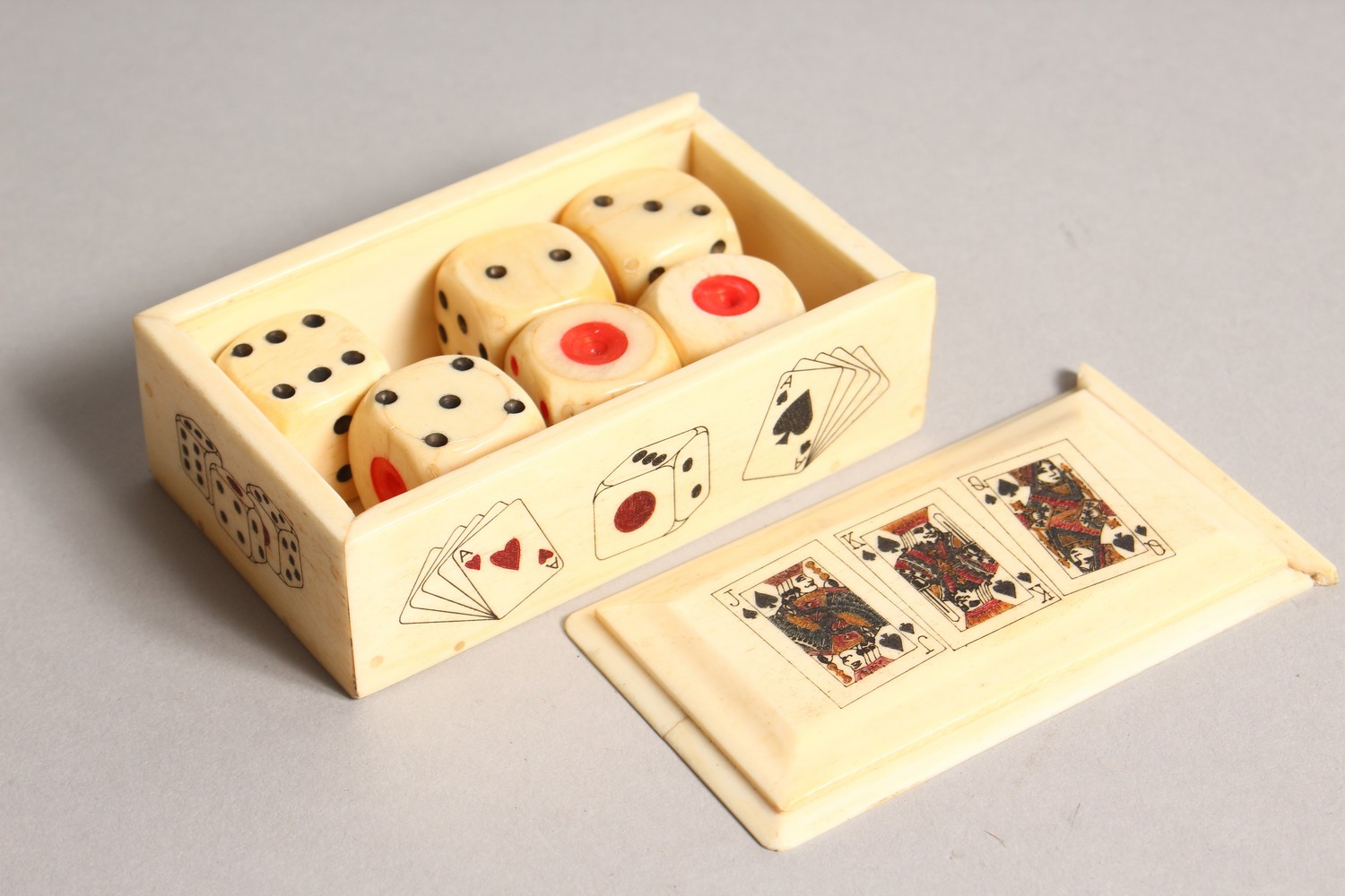 A BONE GAMING BOX, containing dice. 3.5ins long. - Image 2 of 2