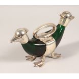 AN UNUSUAL PLATED AND GREEN GLASS DOUBLE ENDED DUCK SHAPE CLARET JUG. 10.5ins long.