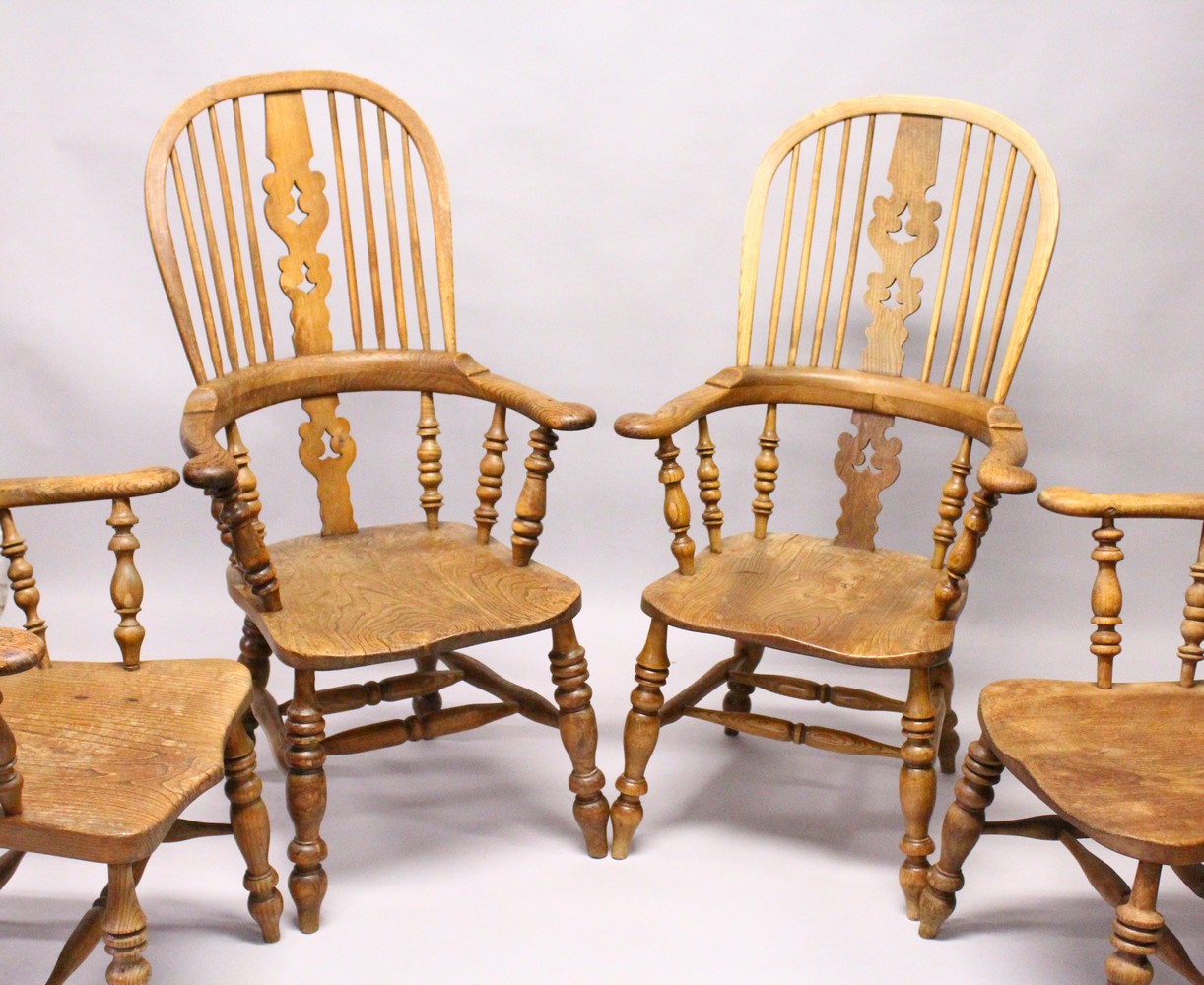 A GOOD SET OF FOUR 19TH CENTURY OAK WINDSOR HIGH BACK ARMCHAIRS. - Image 11 of 11
