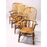 A GOOD SET OF FOUR 19TH CENTURY OAK WINDSOR HIGH BACK ARMCHAIRS.