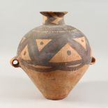 A CHINESE TERRACOTTA BURIAL URN / TOMB POT.