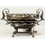 A REGENCY WROUGHT IRON OVAL FIRE BASKET, fitted with a gas burner. 72cms long x 31cms wide x 44cms