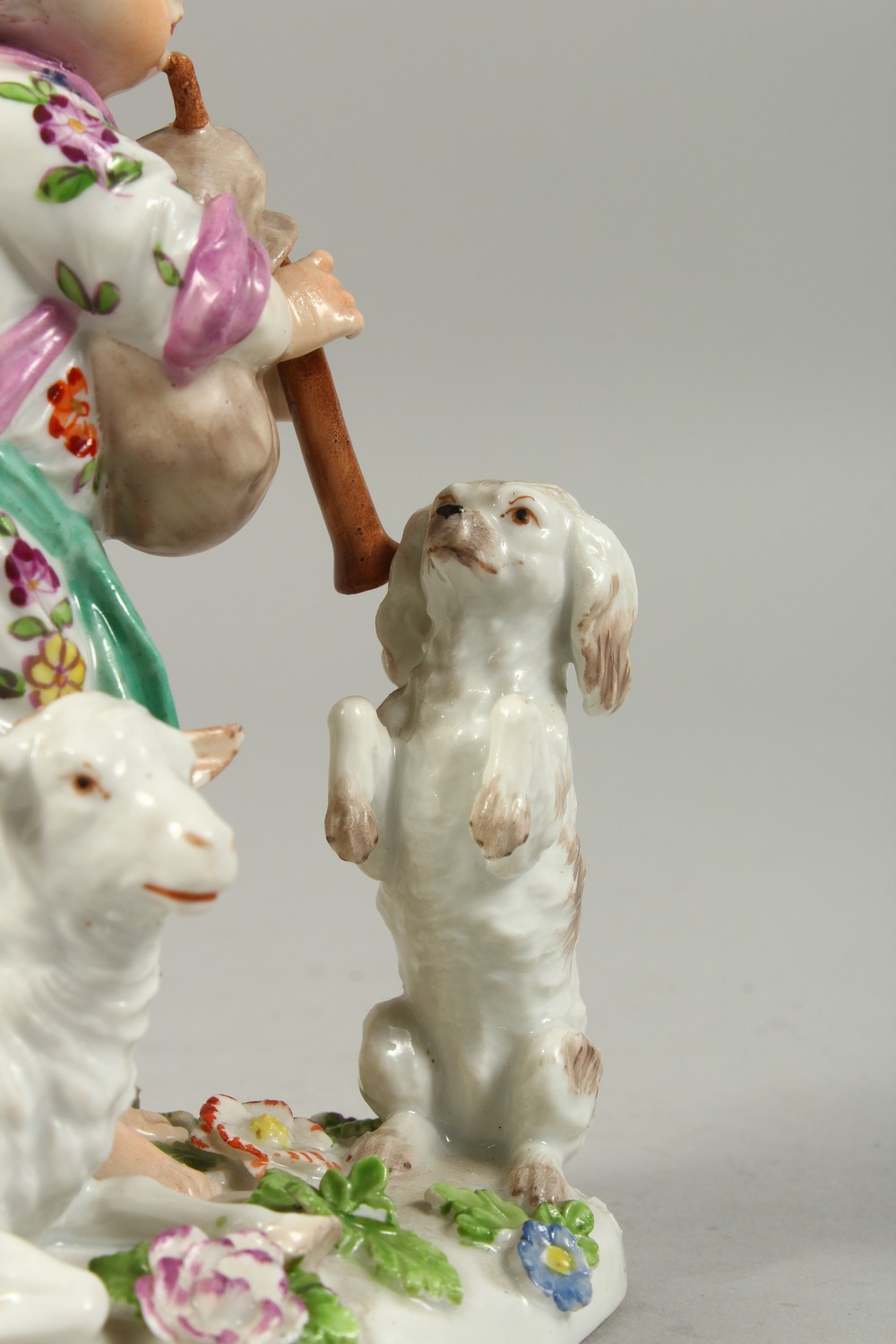 A VIENNA PORCELAIN GROUP OF A YOUNG BOY PLAYING A BAGPIPE, a dog on its hind legs and a sheep by his - Image 3 of 10