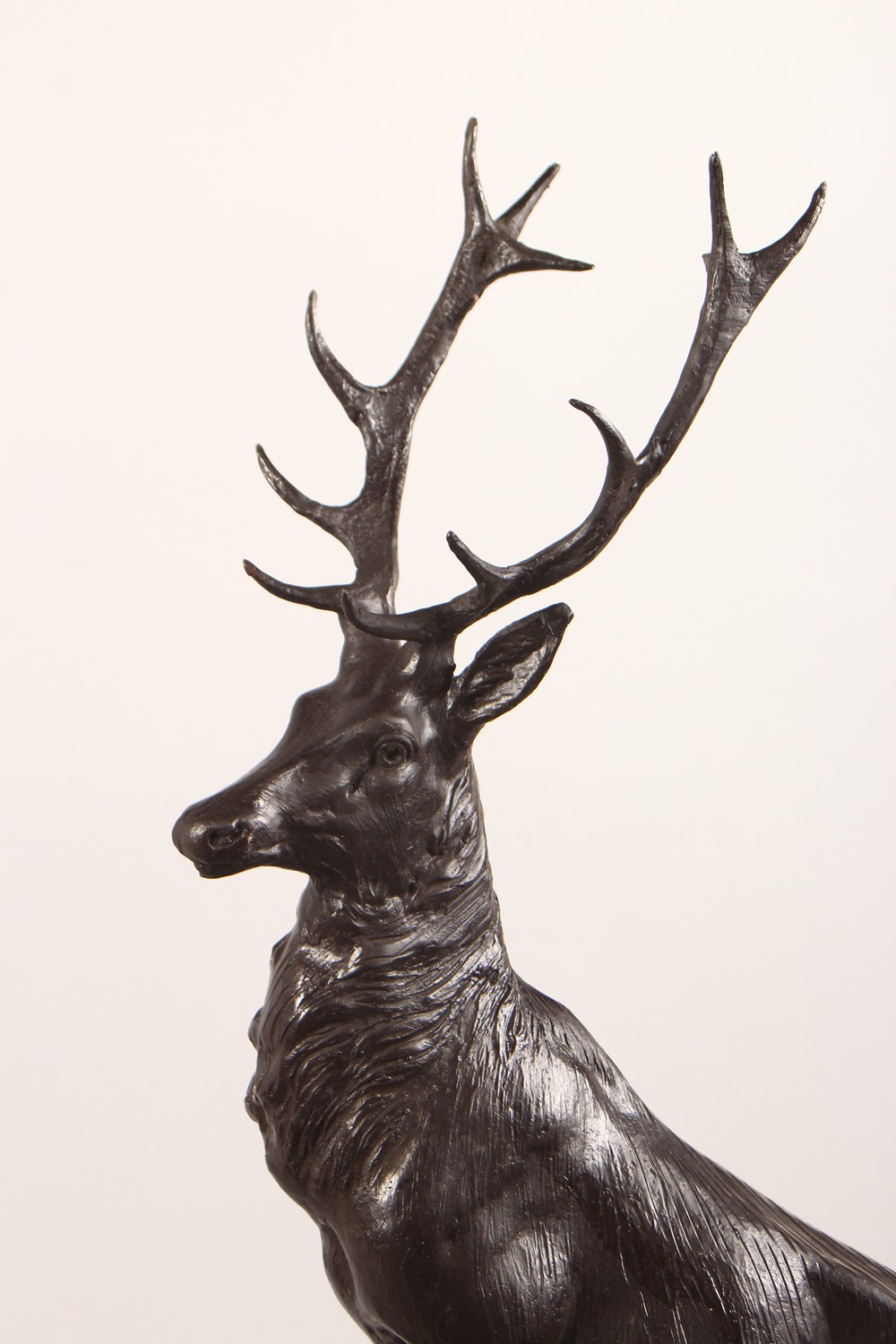 A PAIR OF LARGE BRONZE STAGS, standing on a rock, on marble bases. 29ins high. - Image 3 of 7